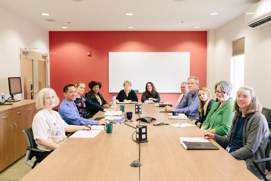 Team sitting at conference table